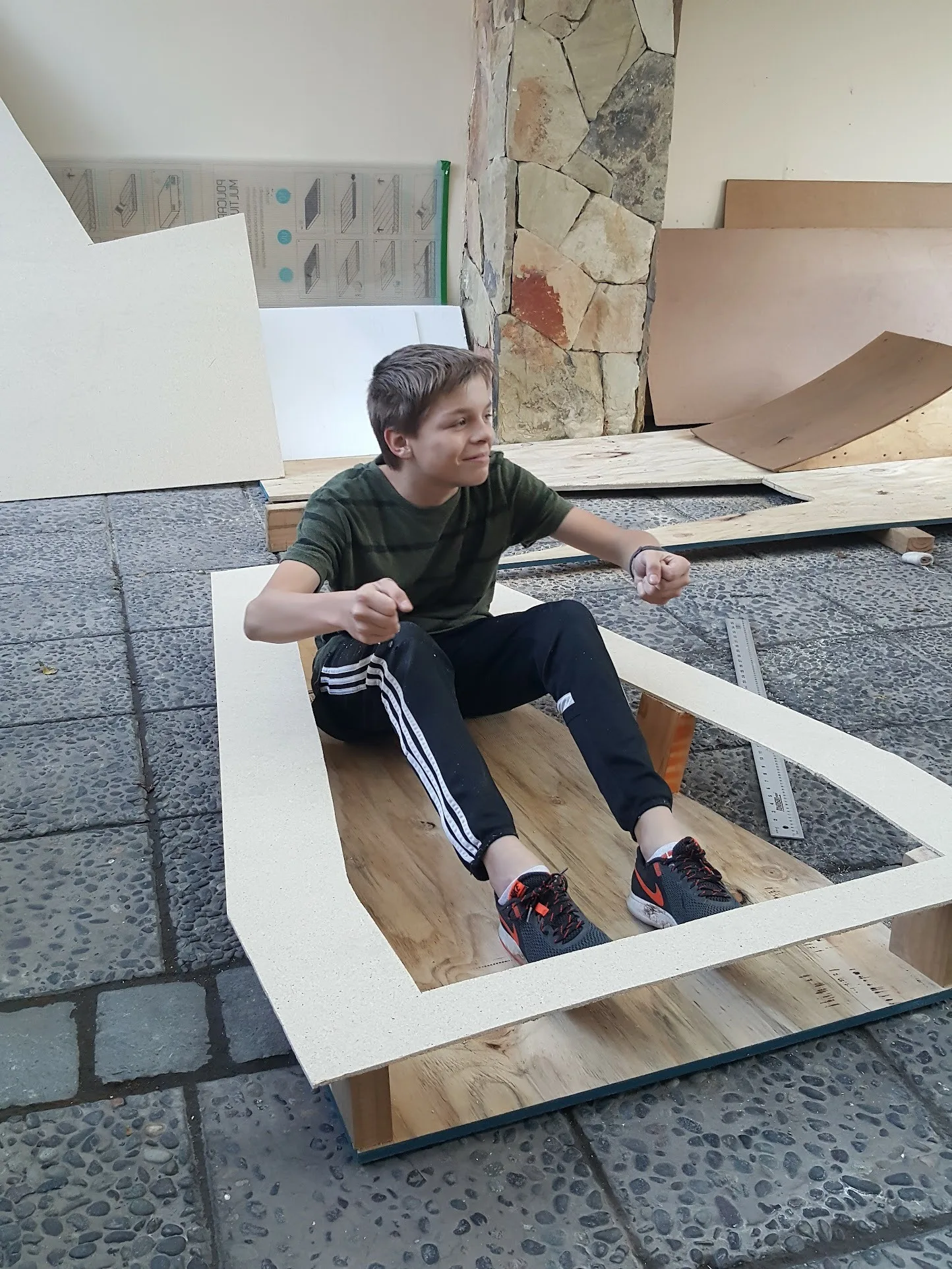 Building a wooden car as a child.